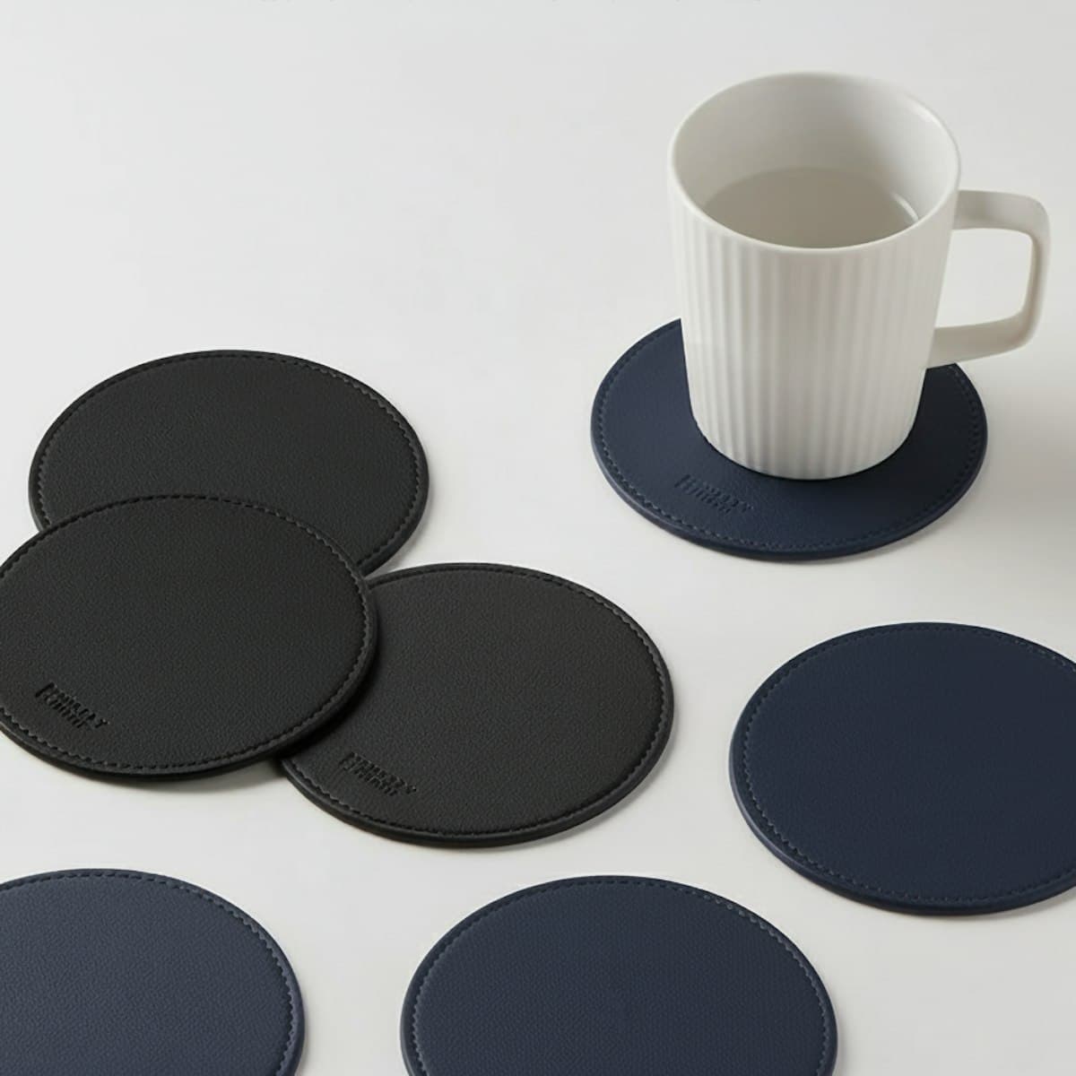 Coaster da - in logo